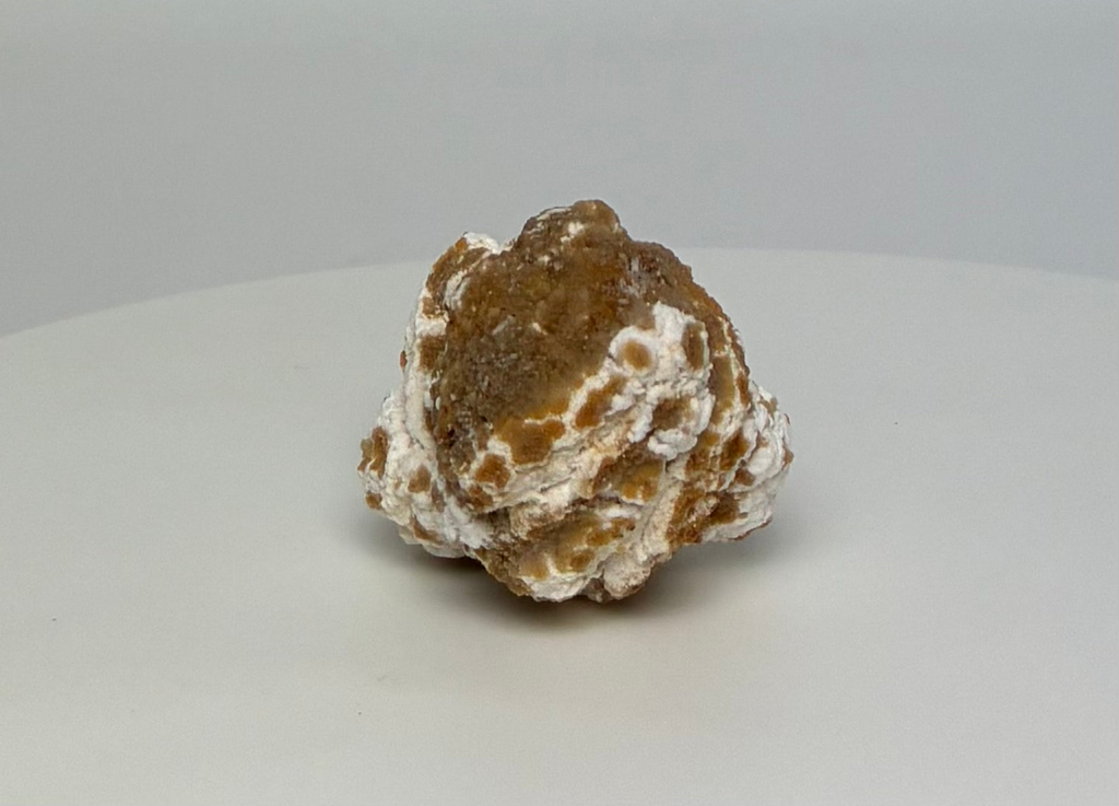 Popcorn Selenite with Creedite on a white background